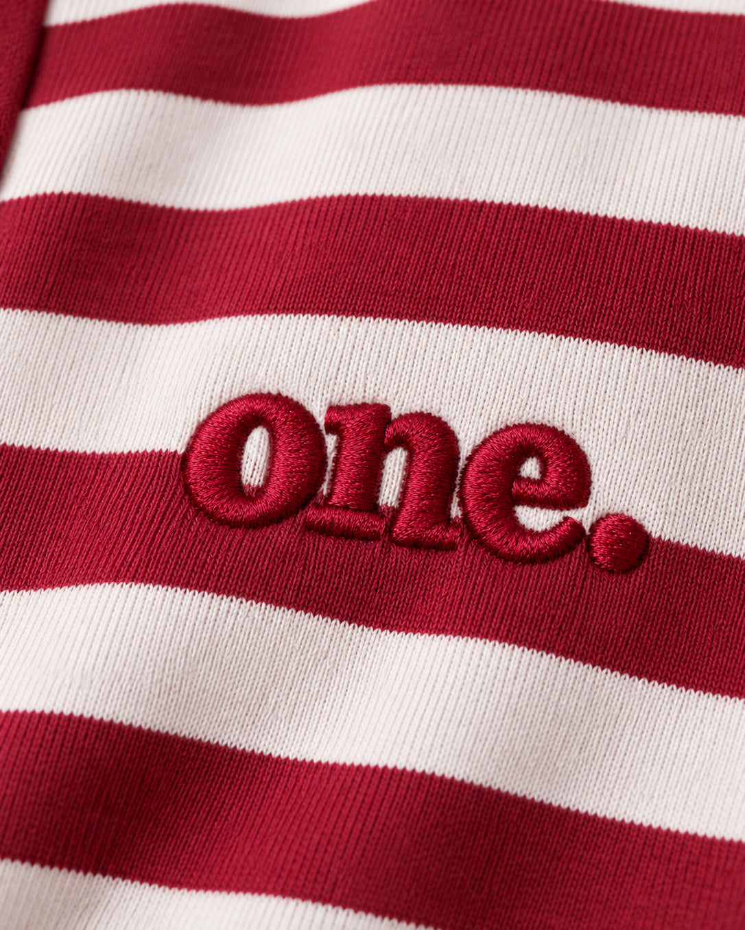 Studio Stripe Ruby Polo Tee — detail view