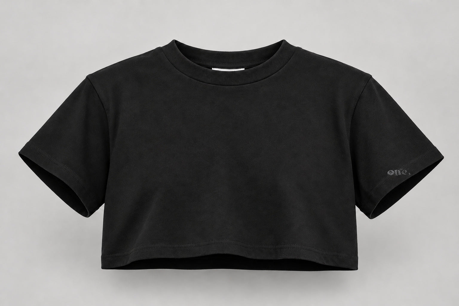 ONE Boxy Crop Black – front, horizontal logo at bottom of sleeve
