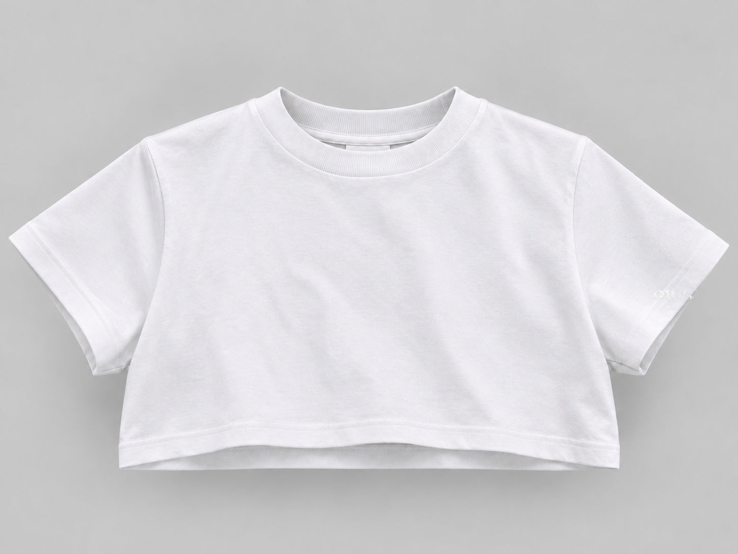 ONE Boxy Crop White – front, horizontal logo at bottom of sleeve