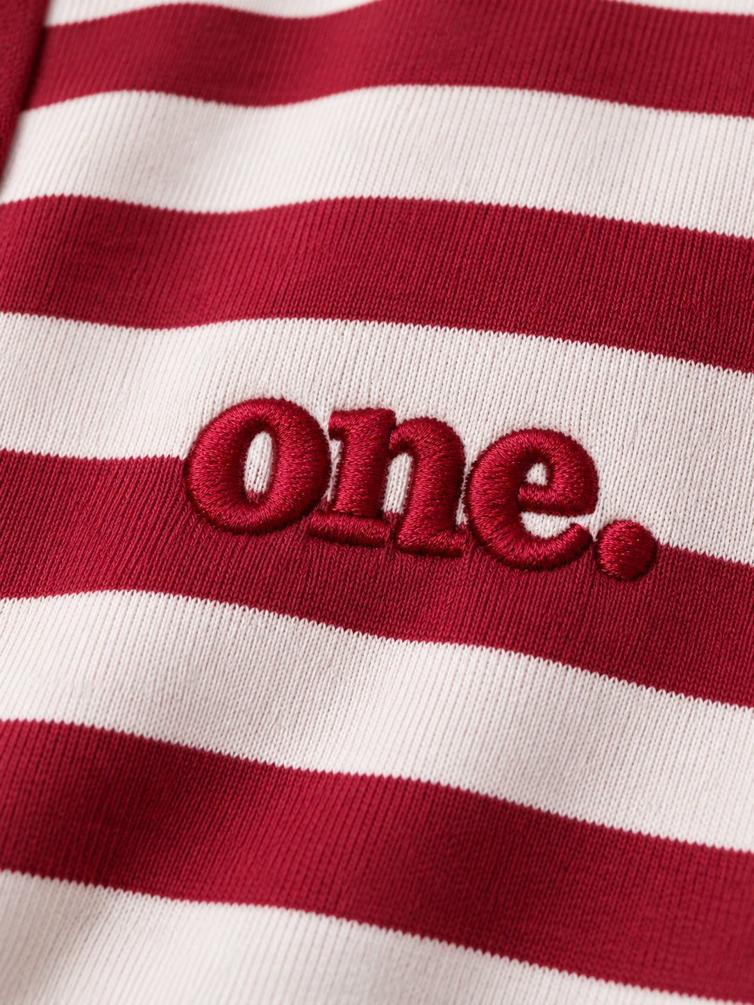 Studio Stripe Ruby Polo Tee — detail view